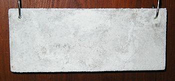 Plaque de plomb oxydée, un pigment blanc.